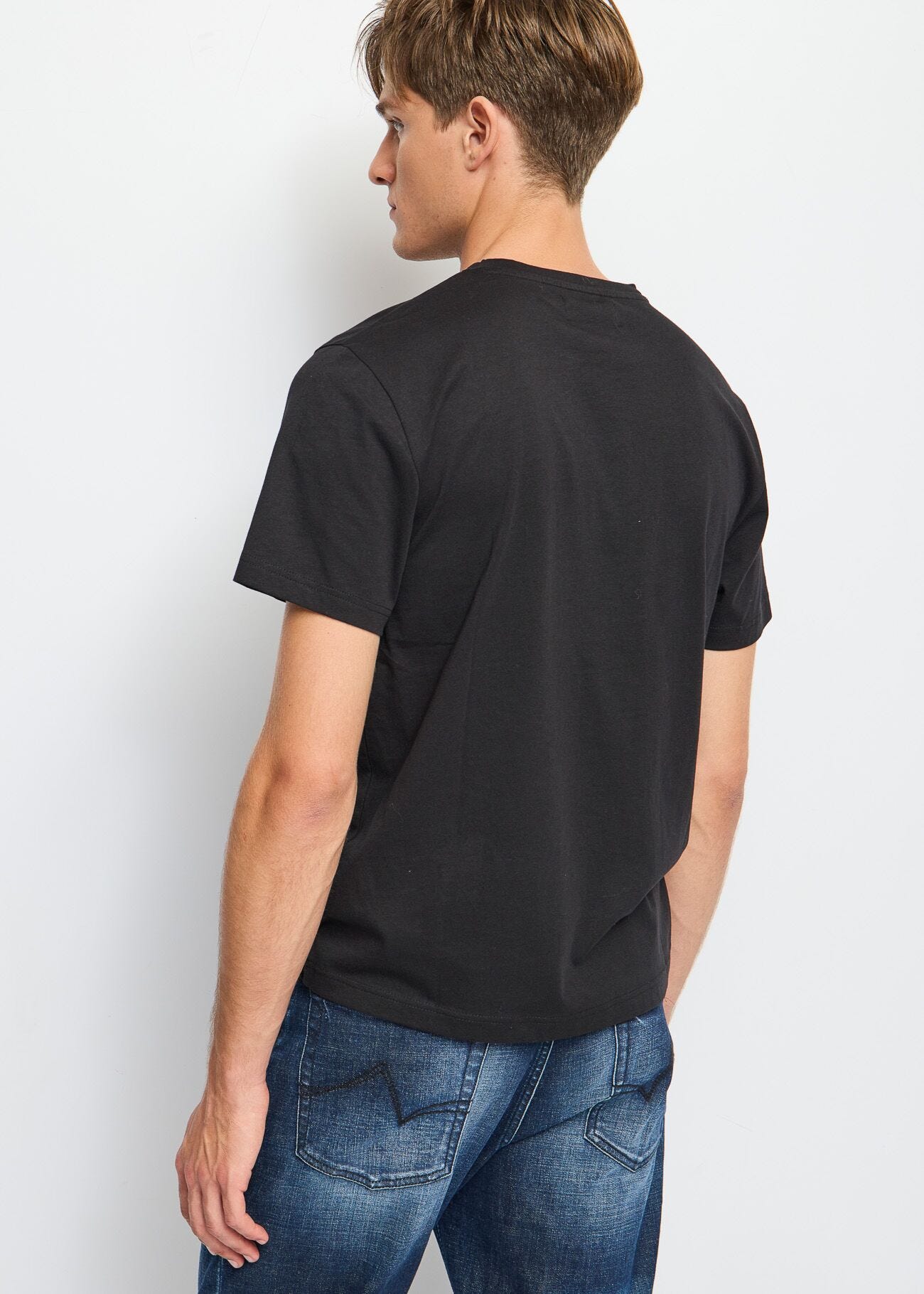 T-shirt nera in cotone con logo