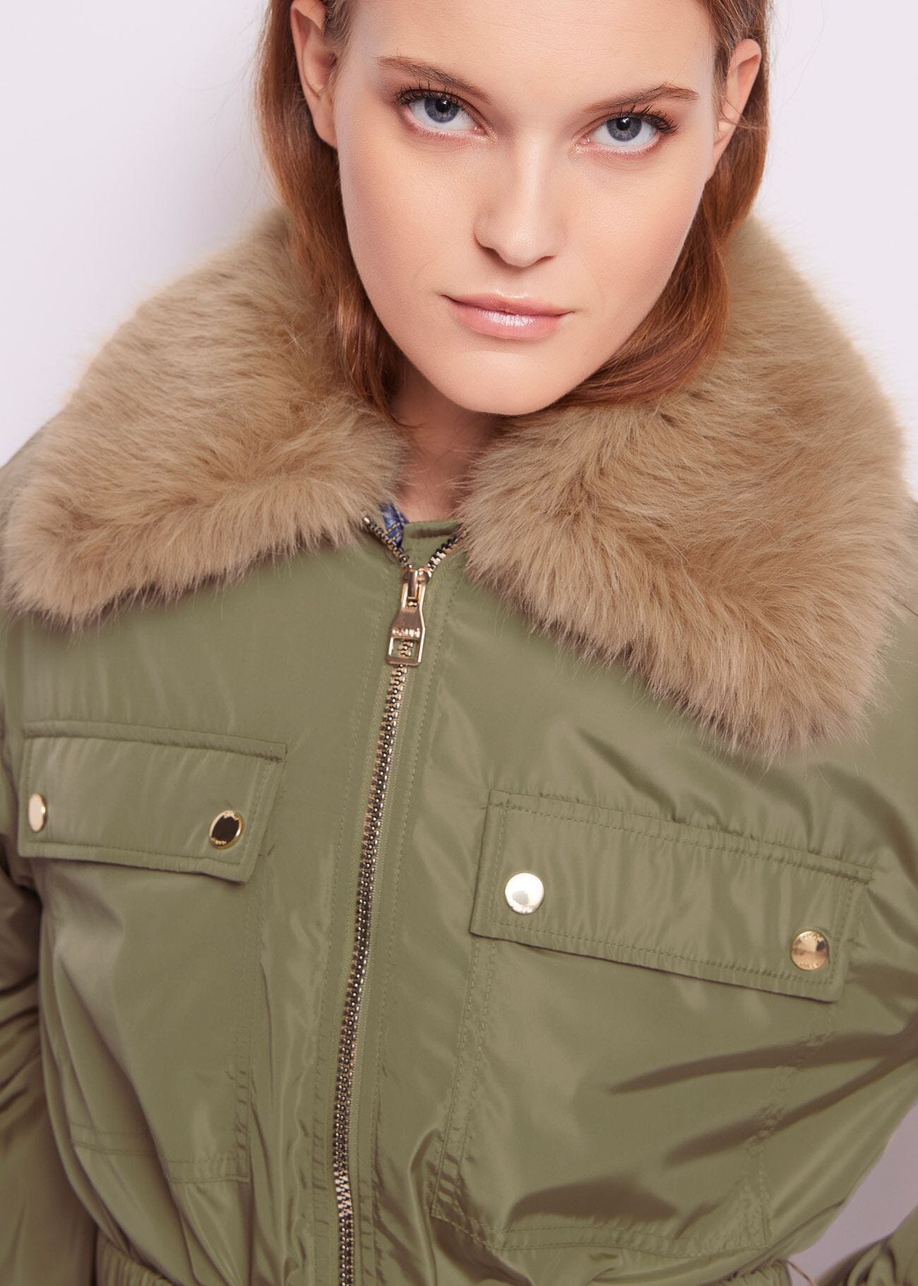 Green nylon down jacket