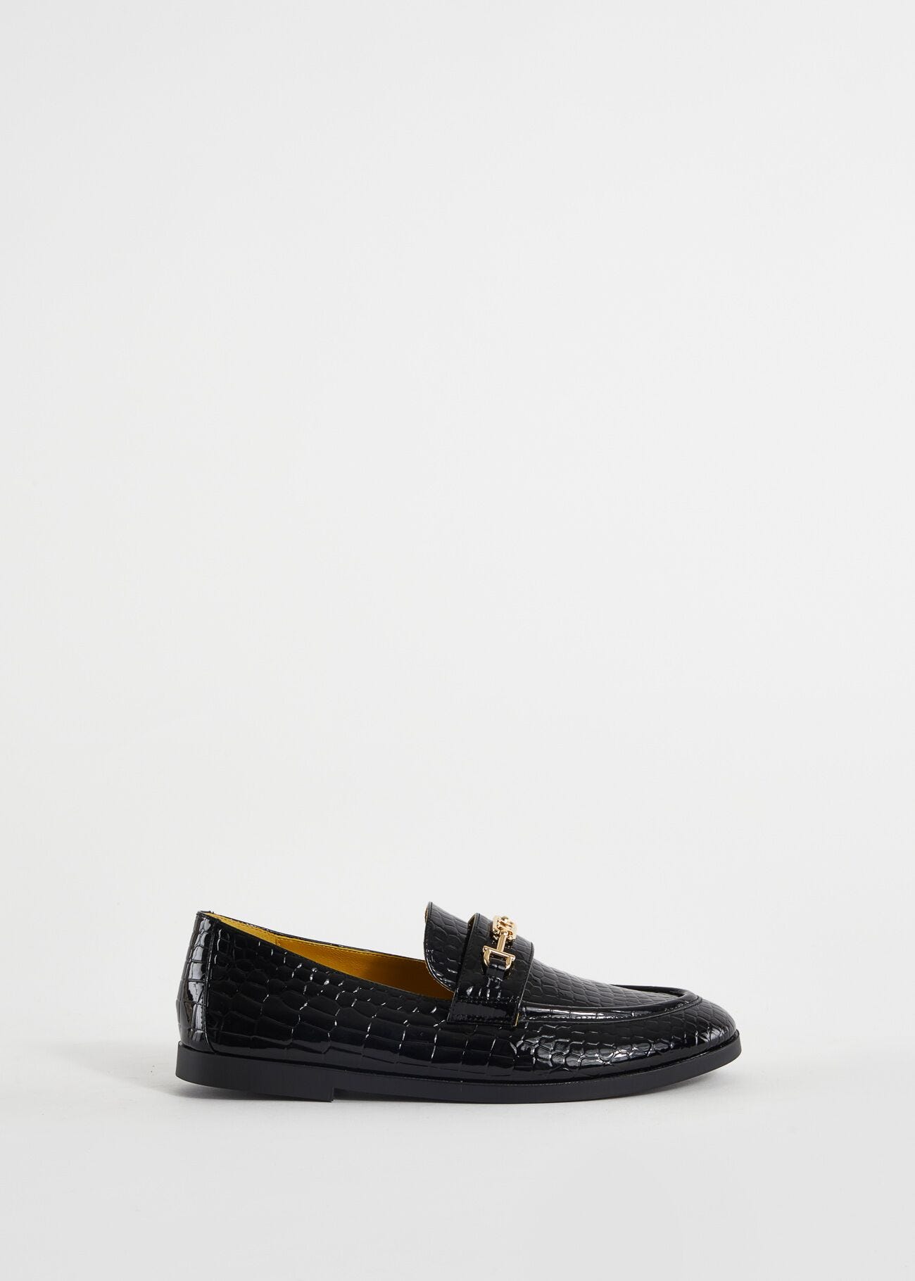 Loafers with crocodile print