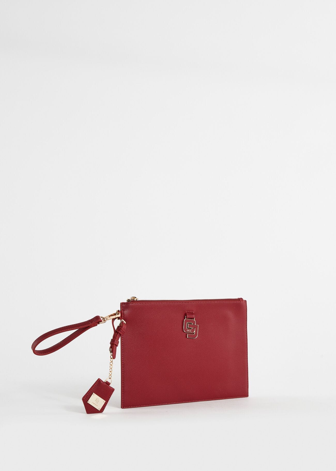 Cartera de mano roja con colgante