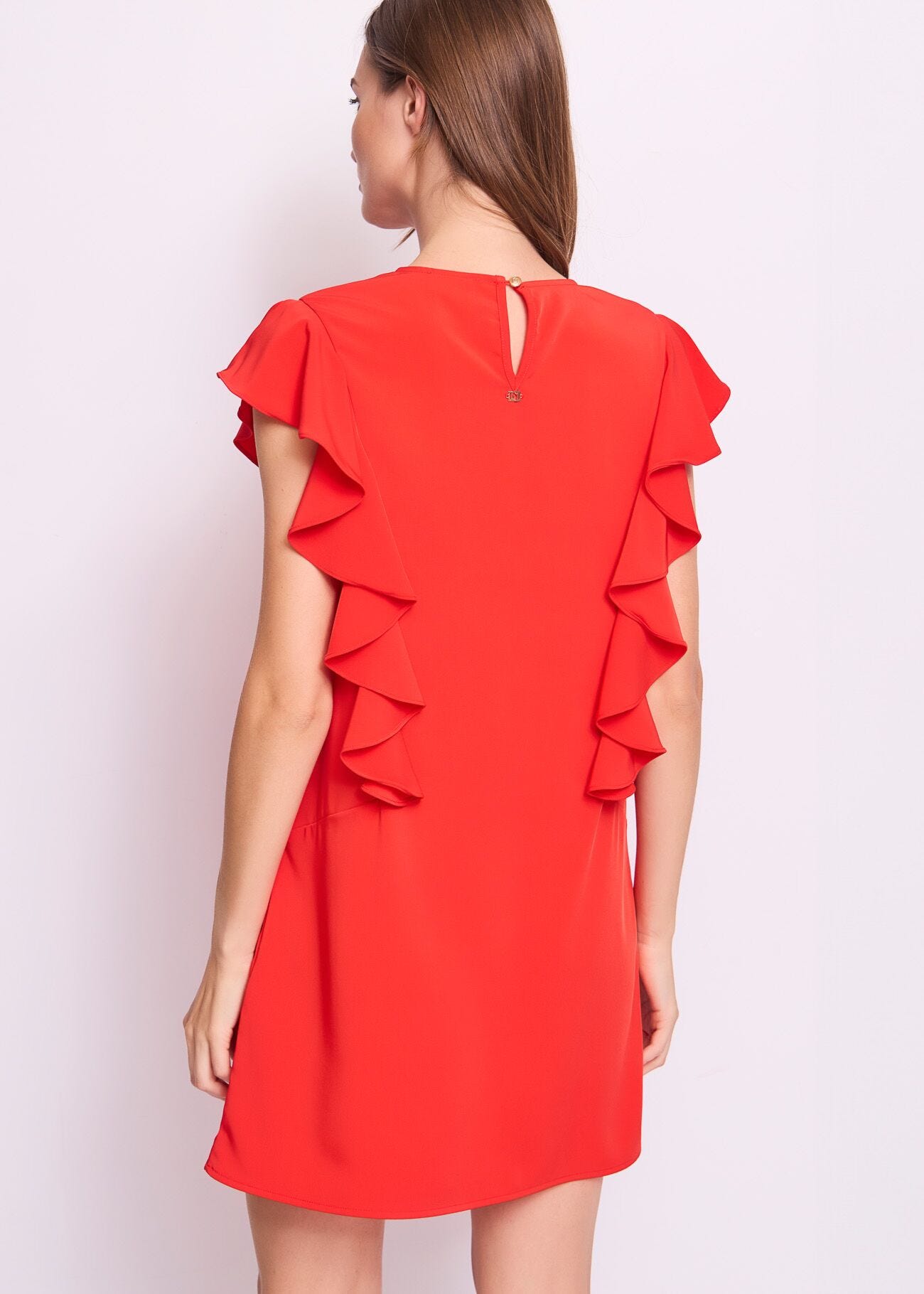 Abito giallo da donna con rouches
