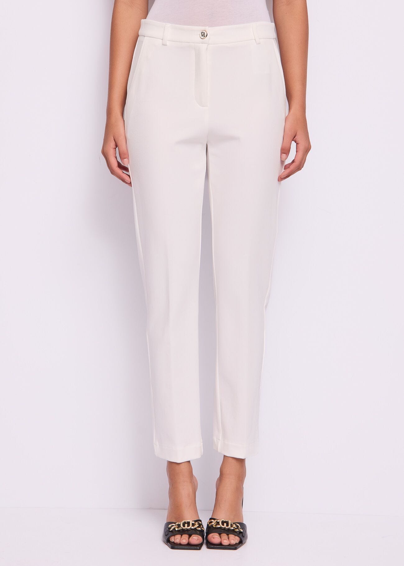 Pantaloni bianchi da donna con piega