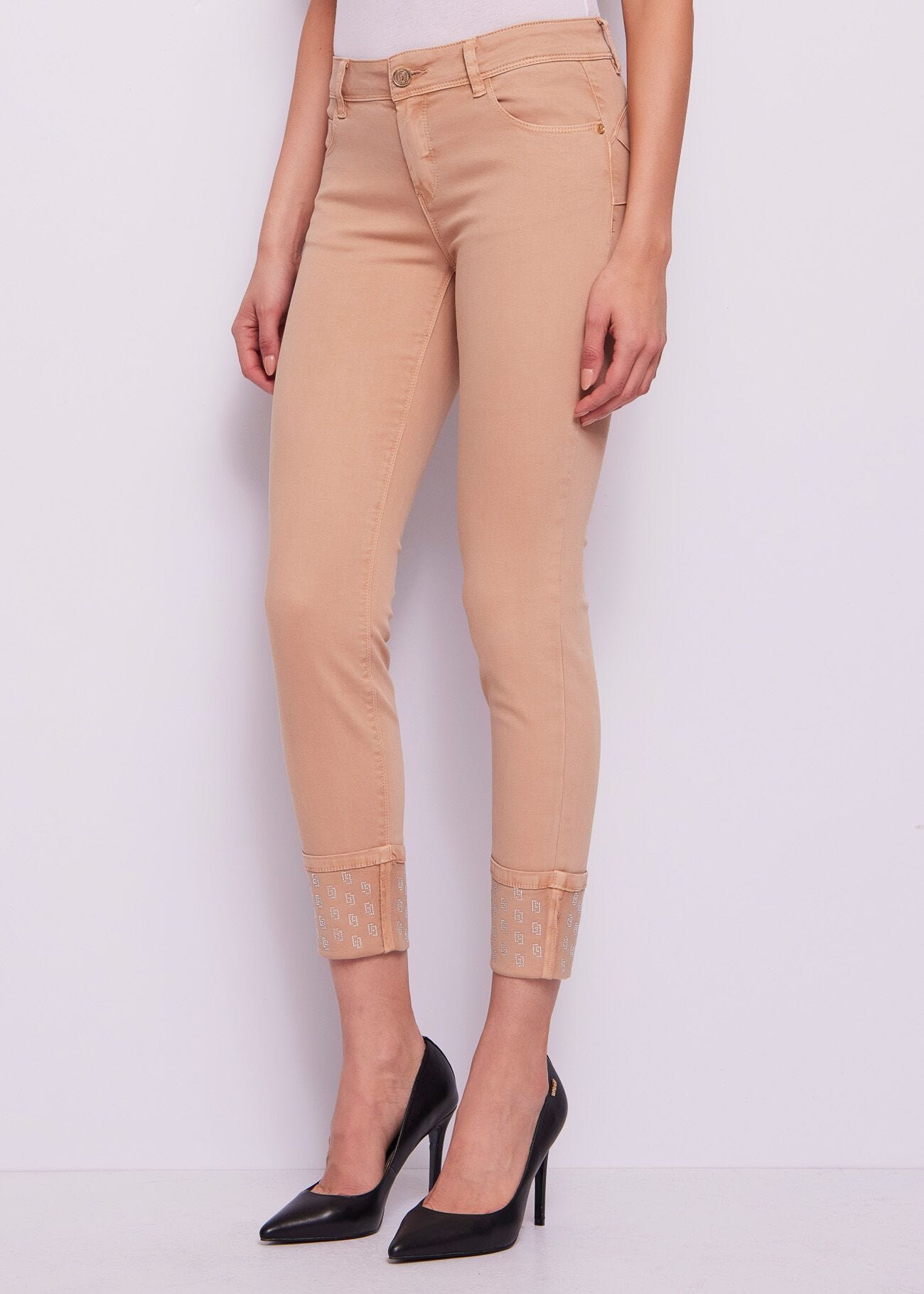 Pantaloni da donna skinny con risvolto