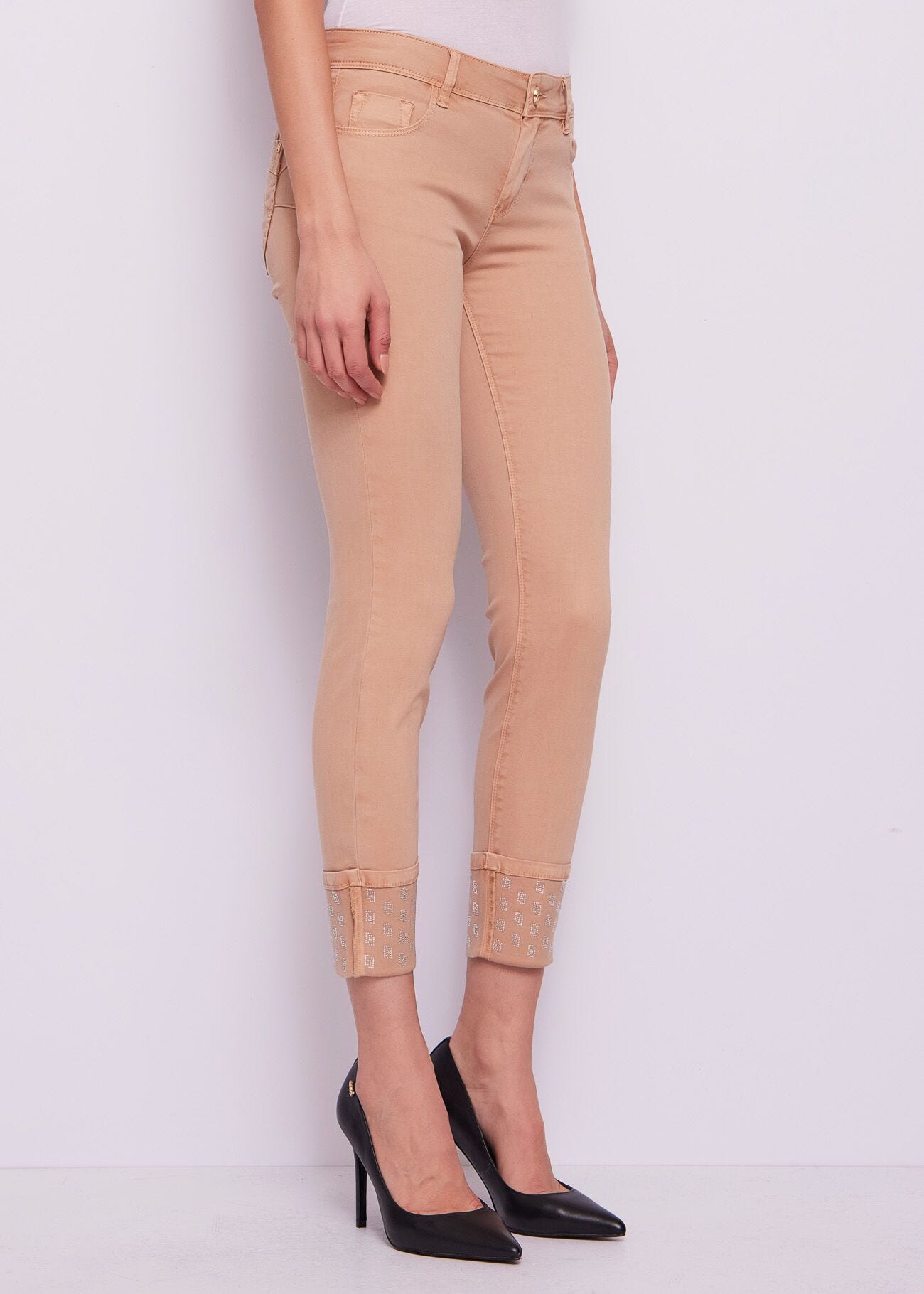 Pantaloni da donna skinny con risvolto