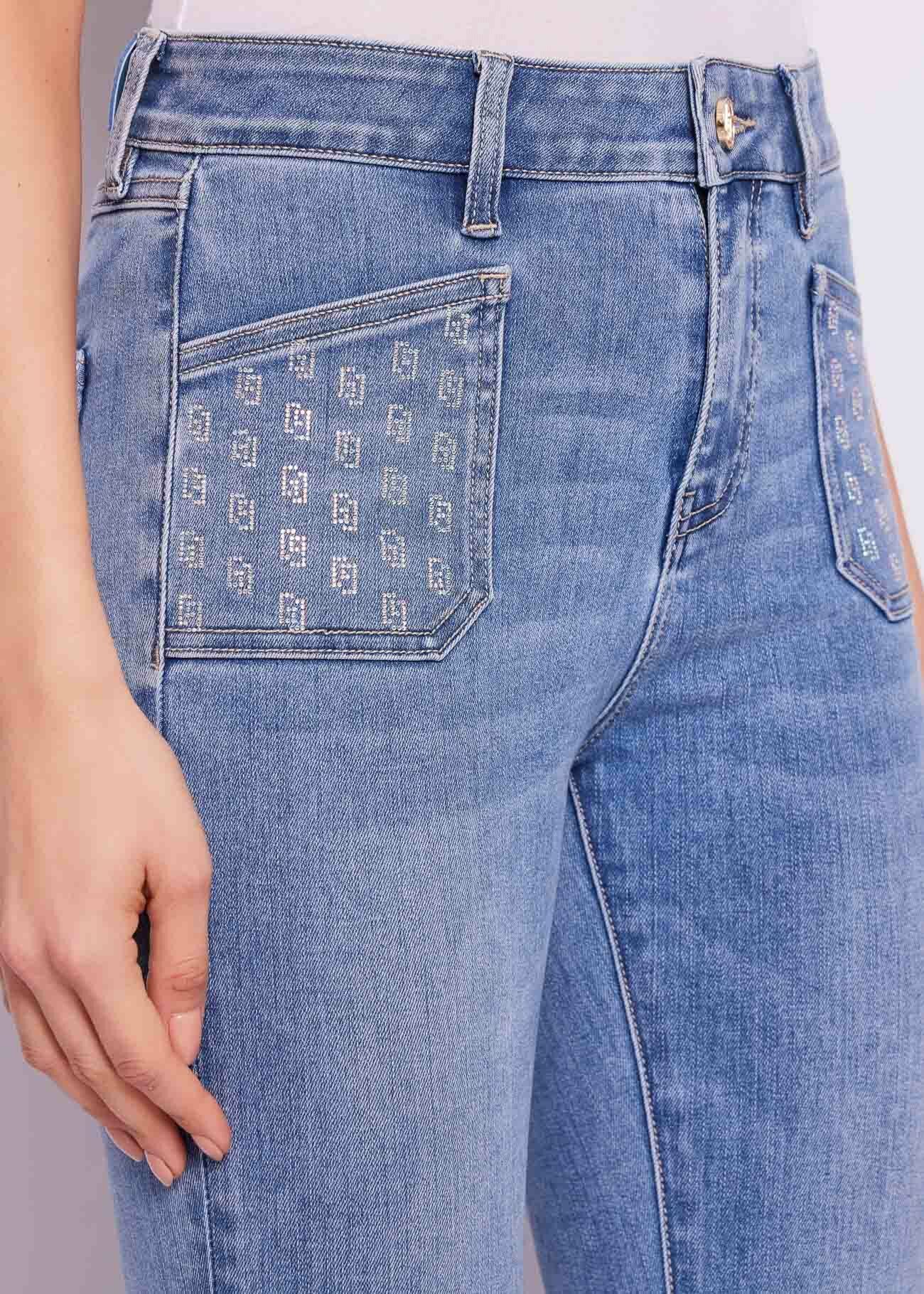 Vaqueros acampanados cropped en algodón para mujer