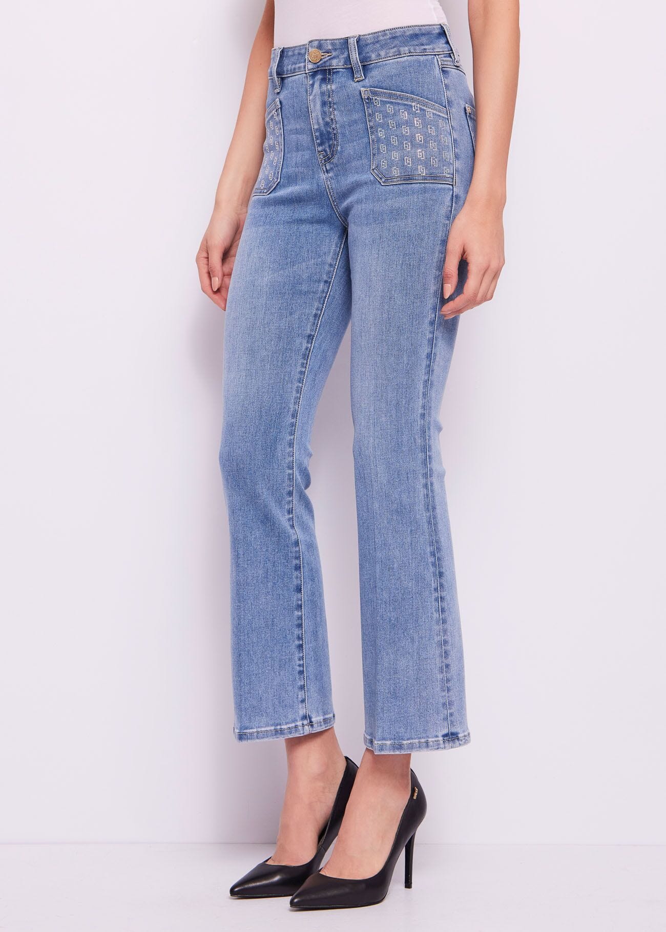 Vaqueros acampanados cropped en algodón para mujer