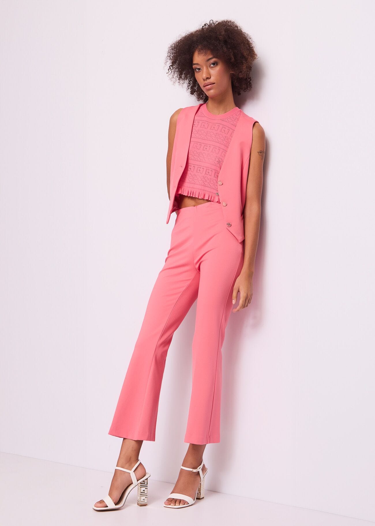 Top rosa de punto para mujer