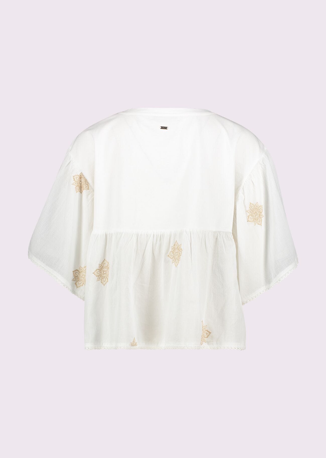 T-shirt da donna bianca con ricami