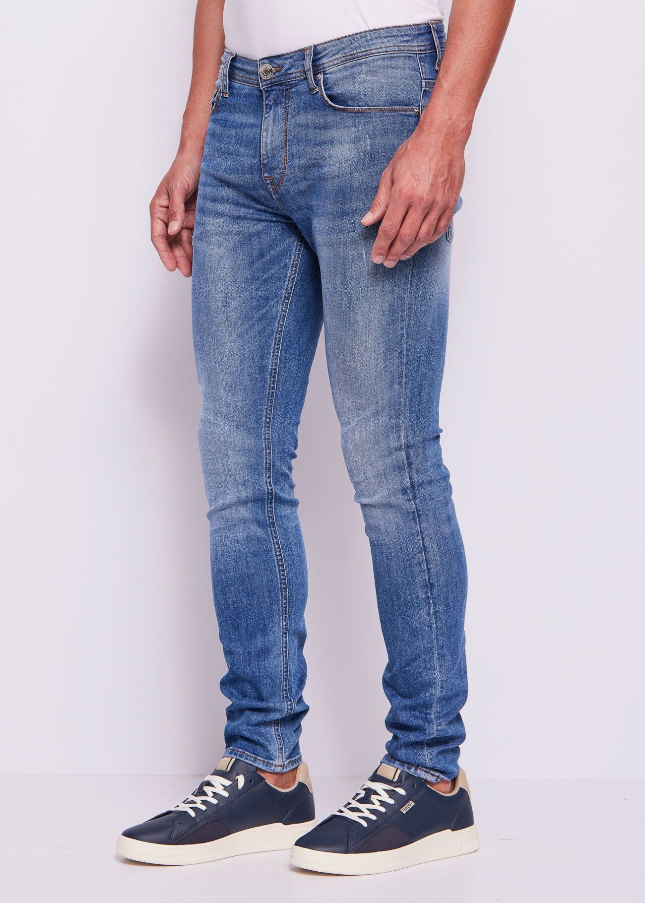 Vaqueros pitillo de algodón desgastado para hombre