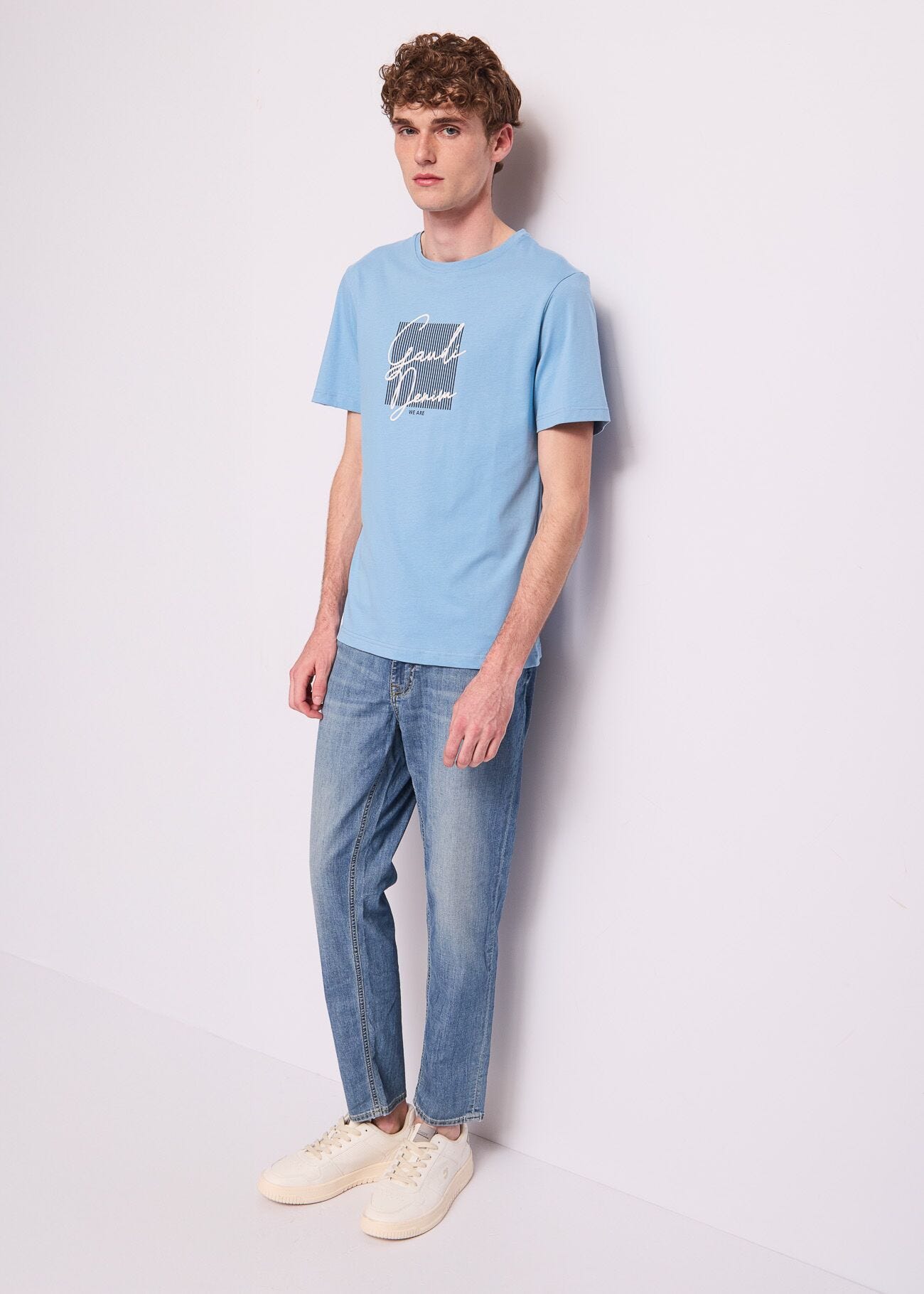 Jean tapered en coton effet usé pour homme