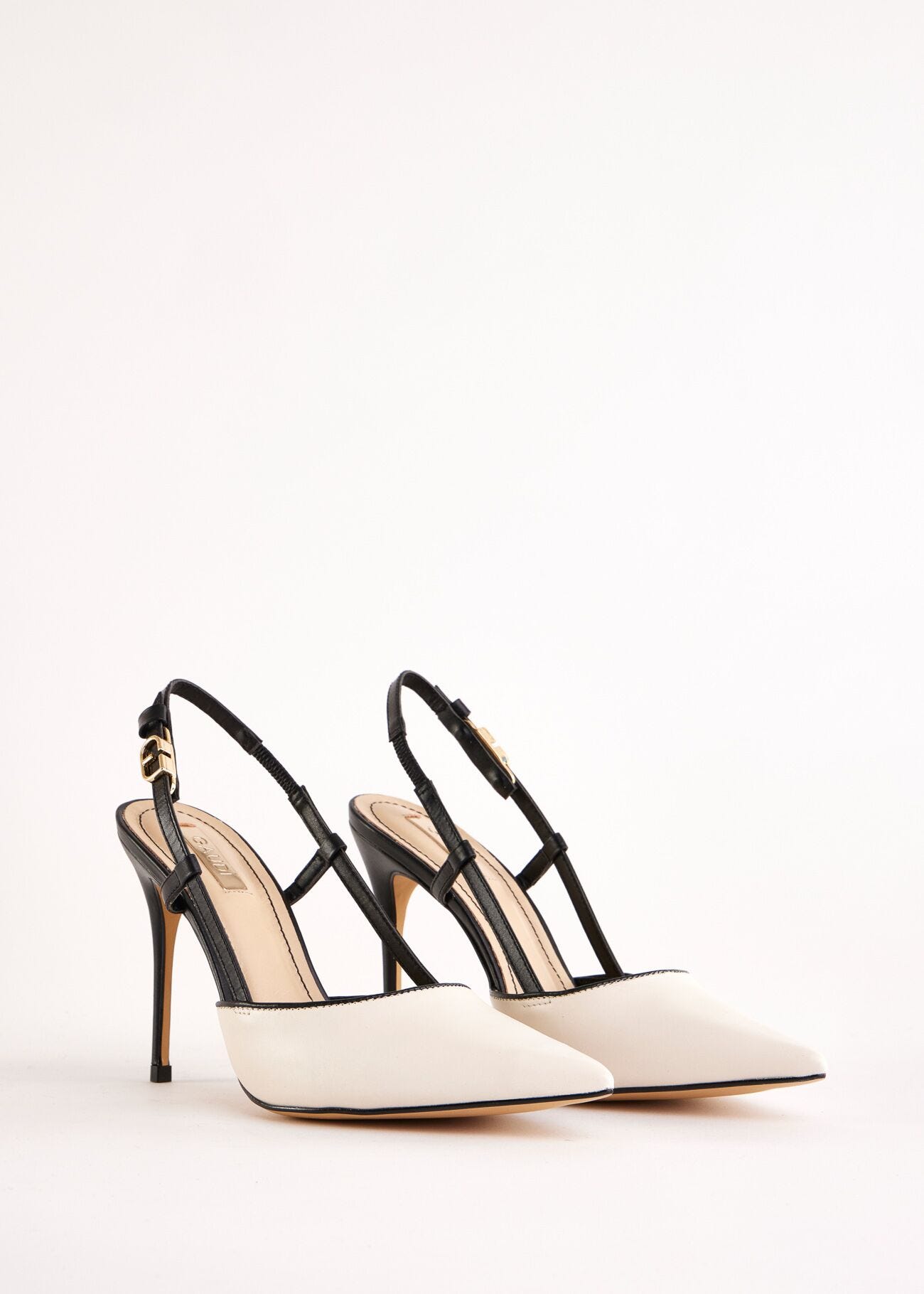 Black and white leather slingbacks