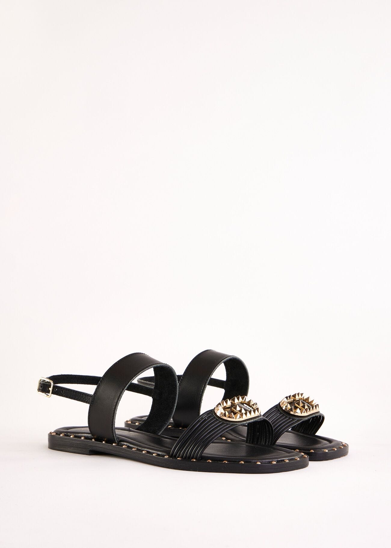 Flat black leather sandals