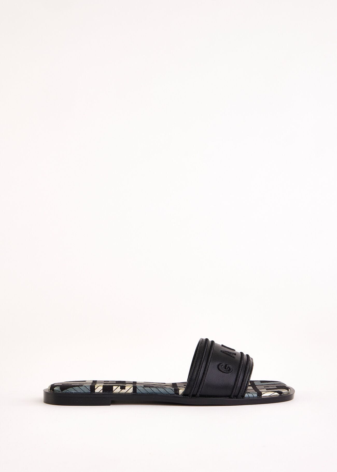 Mules noires en matière synthétique