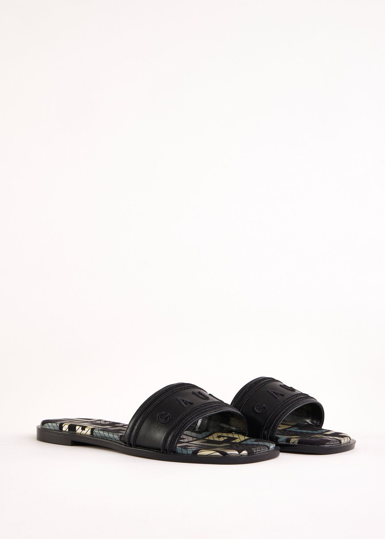 Mules noires en matière synthétique