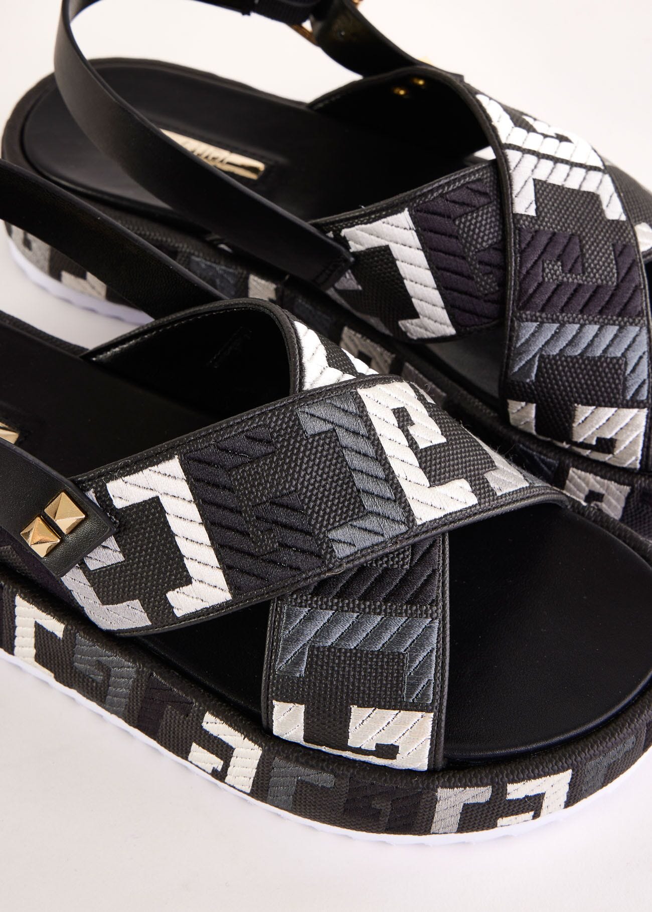 Black canvas and faux-leather sandals