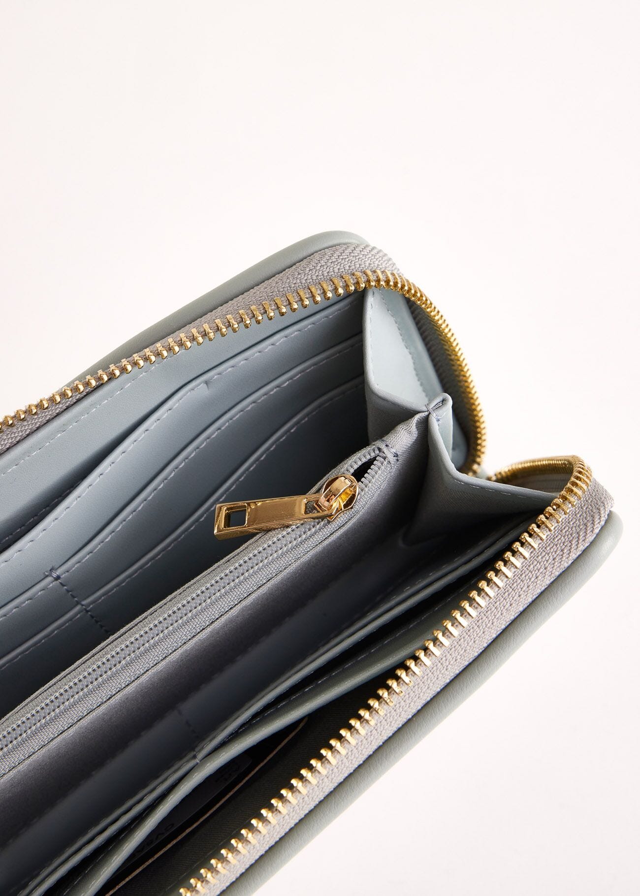 Light blue zip-around wallet