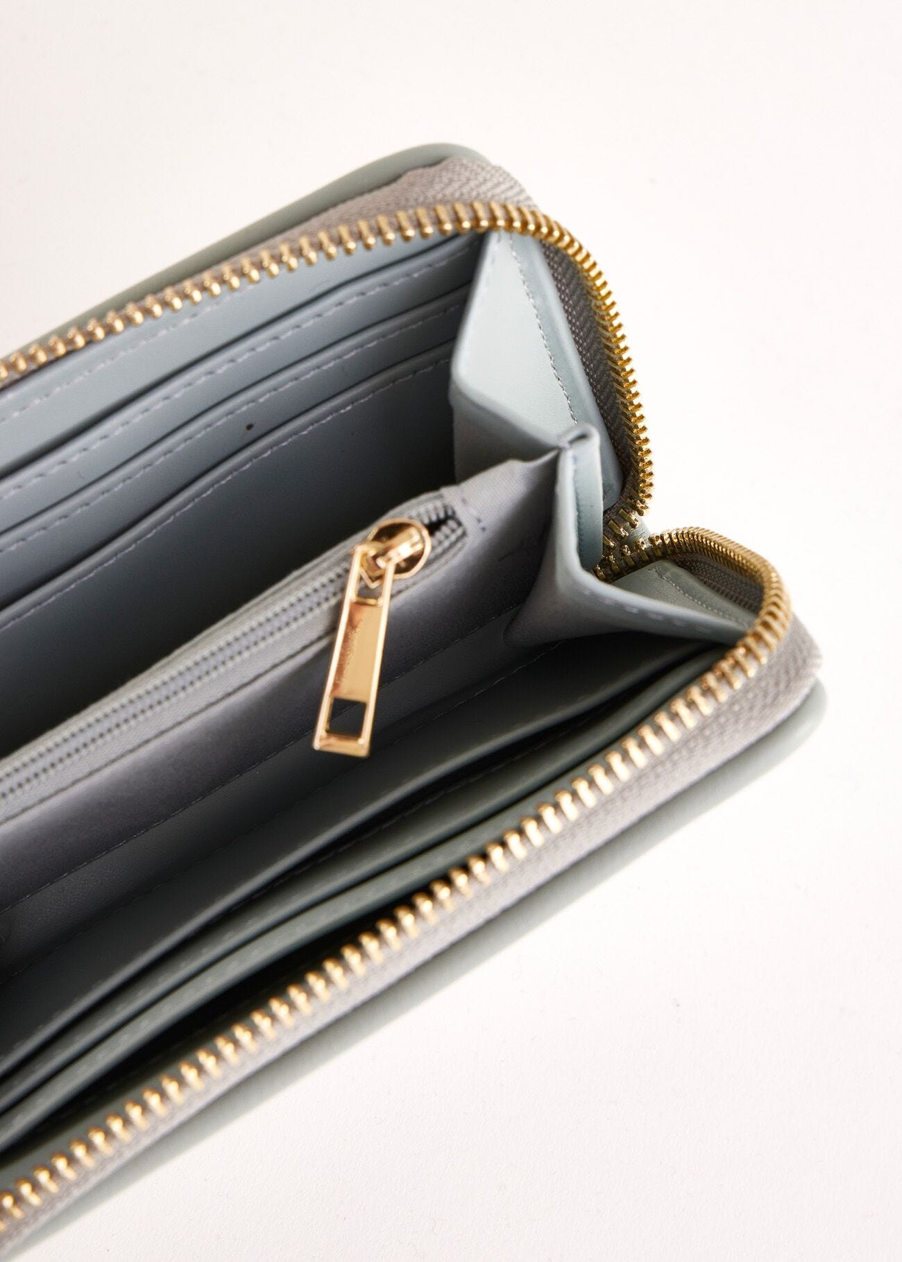 Light blue mini zip-around wallet