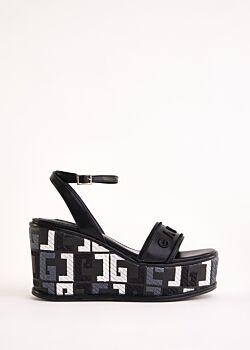 Black faux-leather sandals with logo Gaudì Fashion